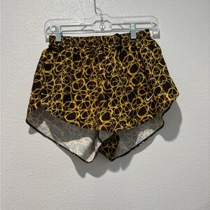 Nike Women's Athletic Shorts with Black and Yellow Design